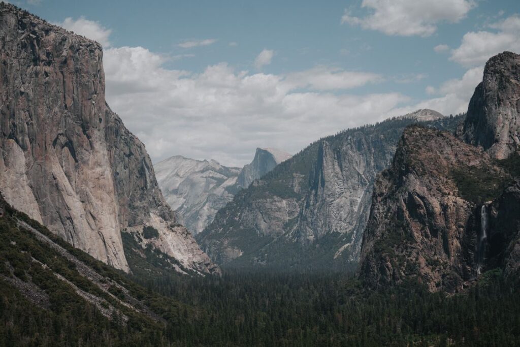 Yosemite Valley from Tunnel View with El Capitan on the left, Half Dome in the distance, and Bridalveil Fall on the right